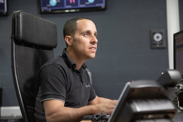 Operations Centre Manager working at his desk in Cornwall