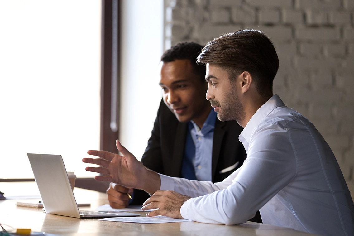 Cybersecurity consultant talking to a client