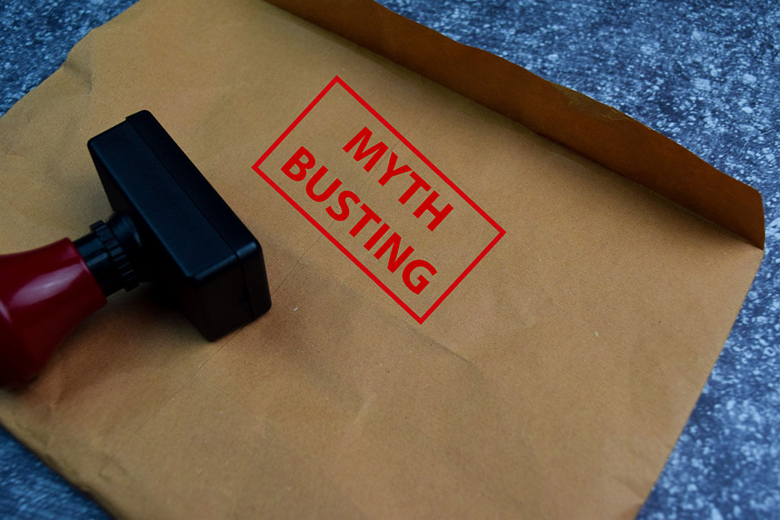 Brown envelope with rubber stamp and red