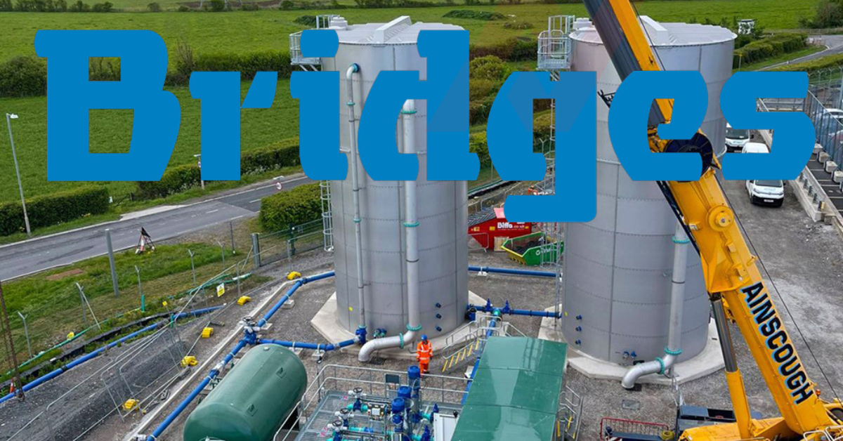 Wide angle image of an electrical engineering centre with Bridges' logo displayed at the top of the image. 