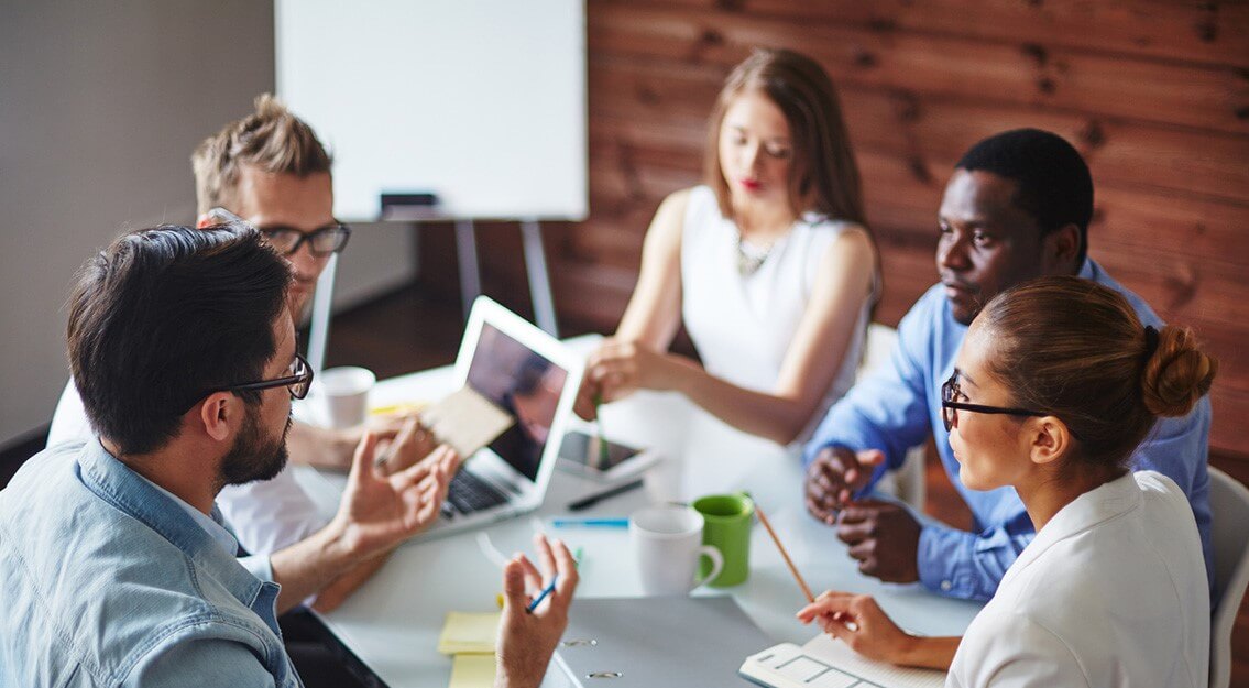 Group of multi-ethnic business partners discussing ideas