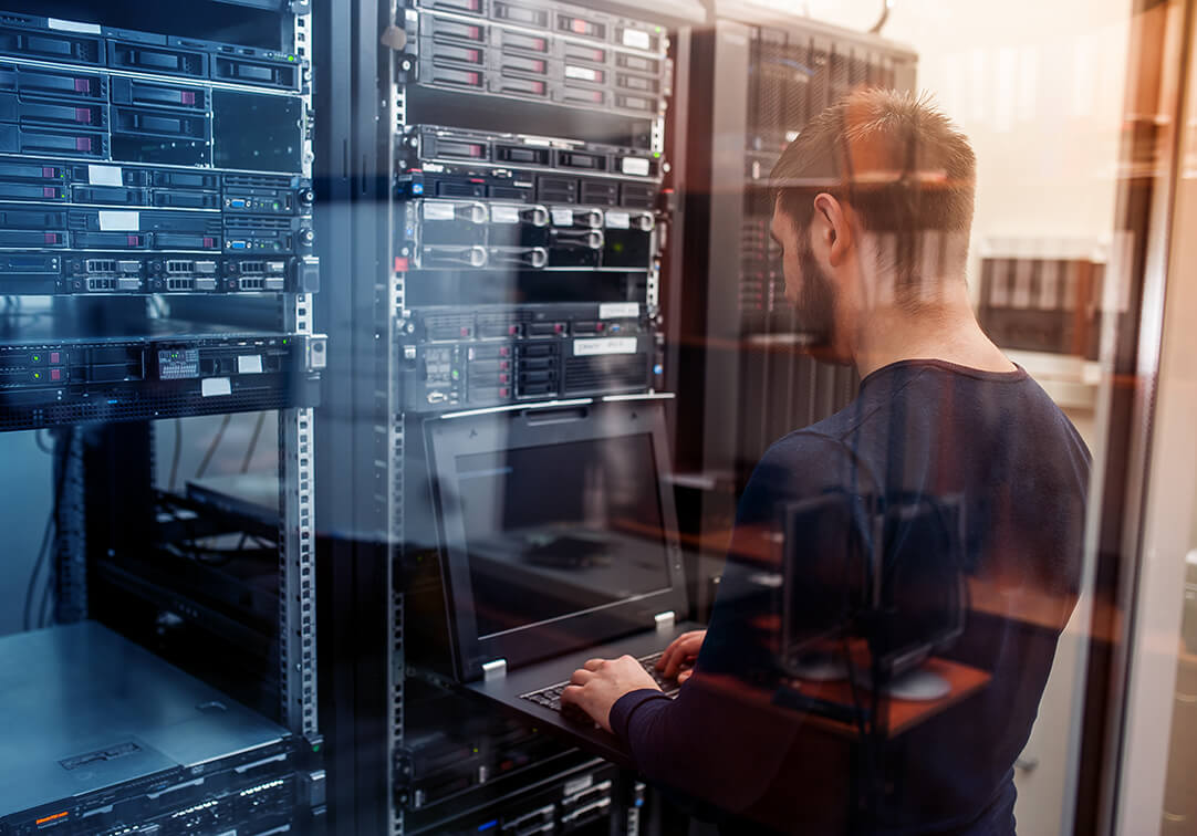 network engineer working in server room