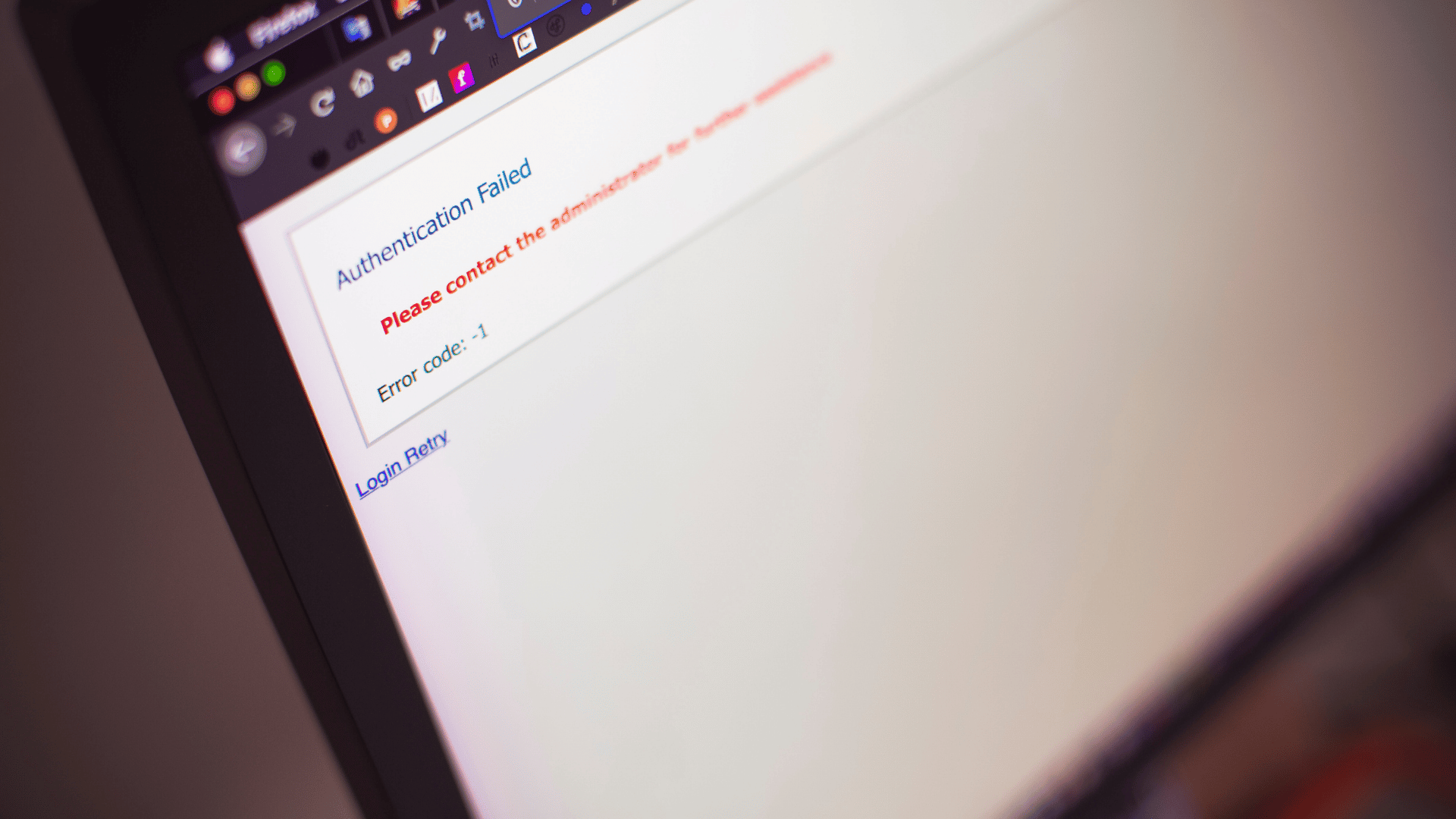 A PC or laptop screen clearly browsing the internet with the words 'Authentication Failed' and please contact the administrator for further assistance.