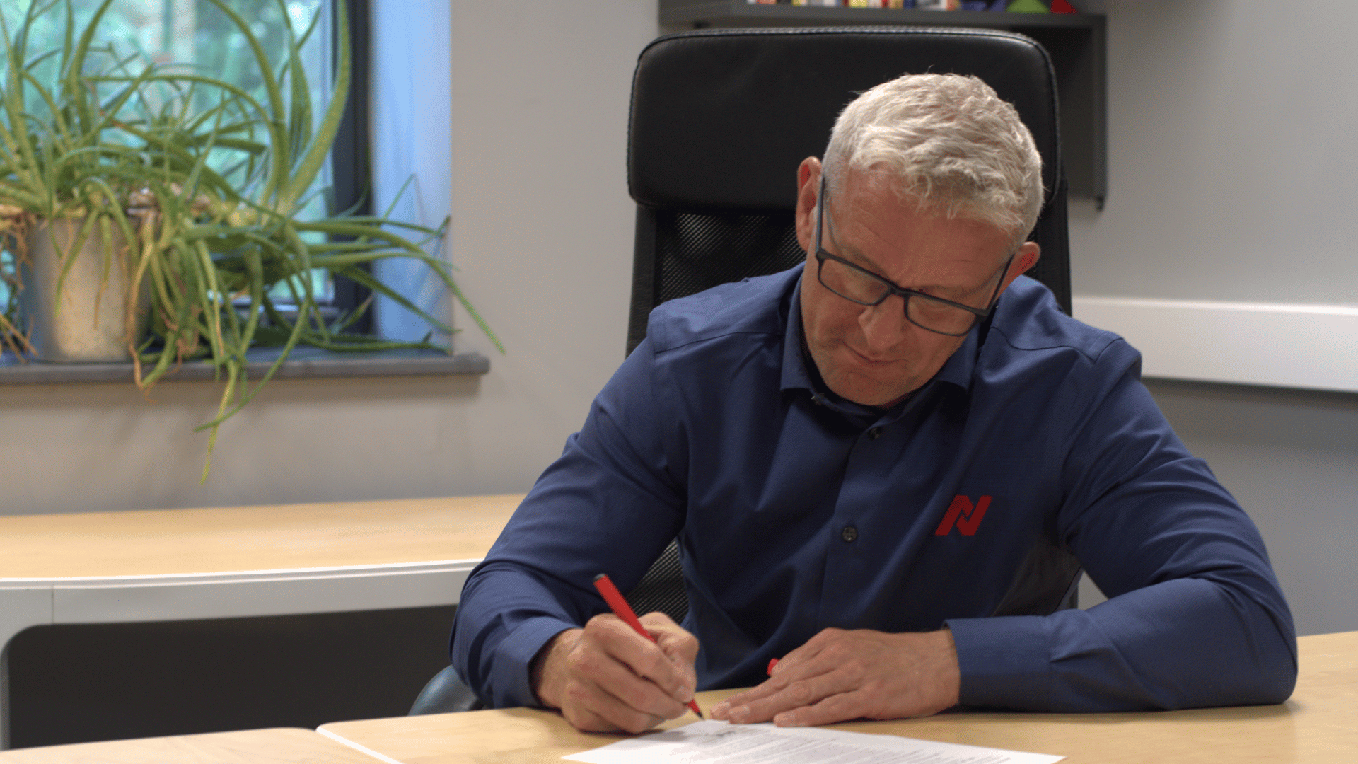 Netitude Managing Director, Adam Harling signing the Cyber Resilience Pledge
