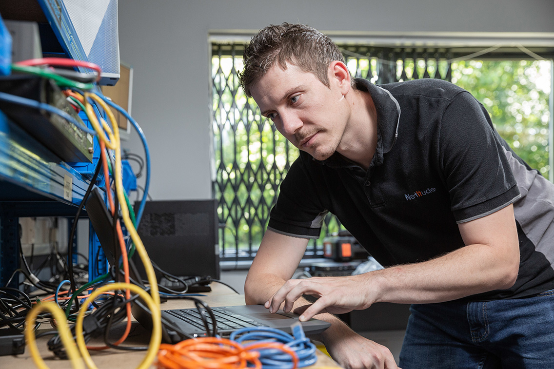 Engineer working at a laptop